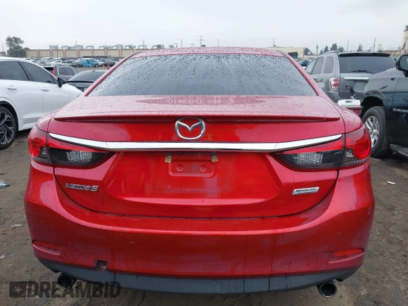 2016 Mazda 6 i Sport with VIN JM1GJ1U54G1457194, listed as a IAAI auction lot 41725704 with 109,628 mi miles and . Bid and sale history available at DreamBid. Image 16.