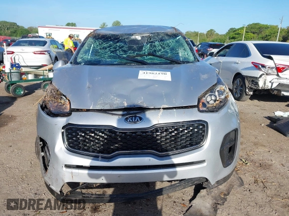2019 Kia Sportage LX with VIN KNDPM3AC8K7591055, listed as a IAAI auction lot 41962190 with 74,003 mi miles. Bid and sale history available at carsss.com. Image 12.