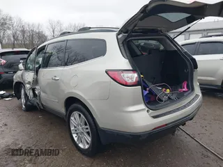 2015 Chevrolet Traverse LT with VIN 1GNKRGKDXFJ241842, listed as a IAAI auction lot 41009812 with 149,158 mi miles. Bid and sale history available at carsss.com. Image 3.