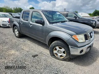 2006 Nissan Frontier LE z VIN 1N6AD07W96C402929, wystawiony jako Copart lot #63877945 z przebiegiem 170 375 mil mil oraz Czysty tytuł • Clean title. Historia ofert i sprzedaży dostępna na DreamBid. Obrazek 4.