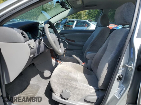 2003 Toyota Corolla CE with VIN 1NXBR32E43Z169570, listed as a Copart auction lot 52905785 with 175,487 mi miles and Salvage Title. Bid and sale history available at DreamBid. Image 7.