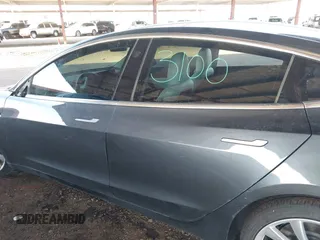 2018 Tesla Model 3 Long Range Battery with VIN 5YJ3E1EA3JF169132, listed as a IAAI auction lot 41678383 with 170,809 mi miles and . Bid and sale history available at DreamBid. Image 15.