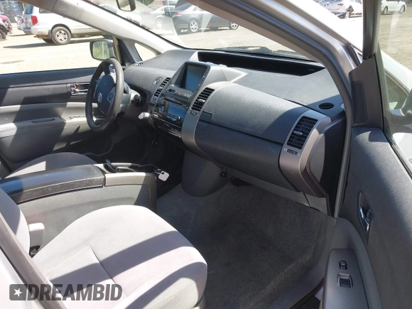2007 Toyota Prius z VIN JTDKB20U177648885, wystawiony jako IAAI lot #42360348 z przebiegiem Nie podano mil oraz . Historia ofert i sprzedaży dostępna na DreamBid. Obrazek 5.