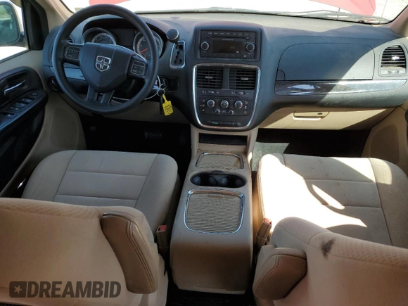 2014 Dodge Grand Caravan SXT with VIN 2C4RDGCG5ER182160, listed as a Copart auction lot 54140505 with 61,576 mi miles and Salvage Title. Bid and sale history available at DreamBid. Image 8.