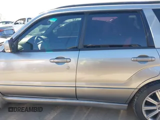 2007 Subaru Forester Sports XT with VIN JF1SG69687H733459, listed as a IAAI auction lot 41827464 with 139,943 mi miles. Bid and sale history available at carsss.com. Image 14.