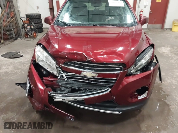 2016 Chevrolet Trax LTZ with VIN 3GNCJRSB9GL166289, listed as a IAAI auction lot 41674434 with 157,109 mi miles. Bid and sale history available at carsss.com. Image 6.