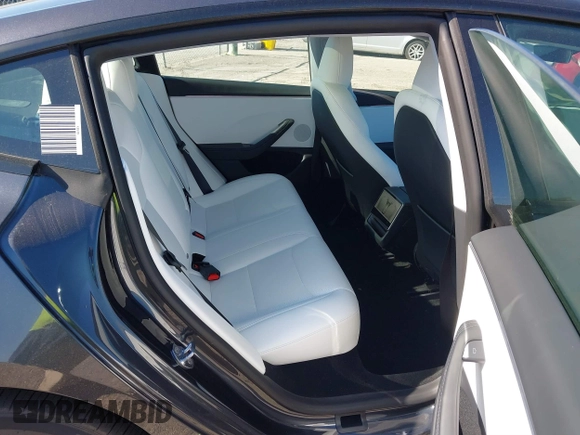 2025 Tesla Model 3 Long Range with VIN 5YJ3E1EA2SF910890, listed as a IAAI auction lot 41791583 with Not Provided miles and . Bid and sale history available at DreamBid. Image 8.