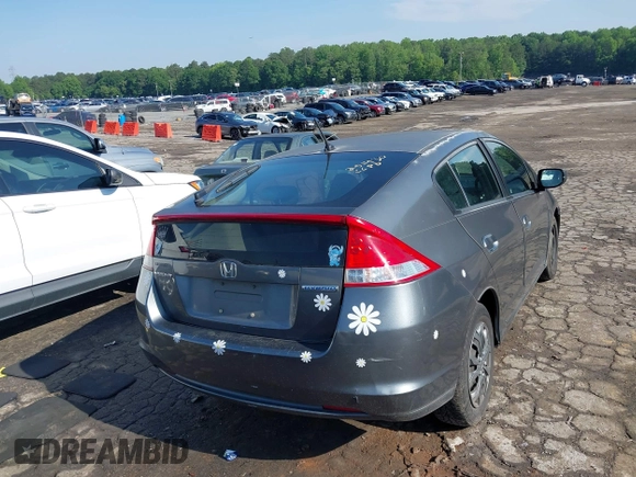 2010 Honda Insight LX with VIN JHMZE2H52AS032697, listed as a IAAI auction lot 42255794 with 262,251 mi miles and . Bid and sale history available at DreamBid. Image 4.