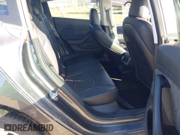 2018 Tesla Model 3 Long Range Battery with VIN 5YJ3E1EA4JF006036, listed as a IAAI auction lot 41934680 with 115,649 mi miles and . Bid and sale history available at DreamBid. Image 8.