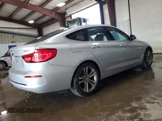 2018 BMW 3 Series 330i xDrive with VIN WBA8Z9C52JG828741, listed as a Copart auction lot 61457015 with 87,064 mi miles and Salvage title. Bid and sale history available at DreamBid. Image 3.