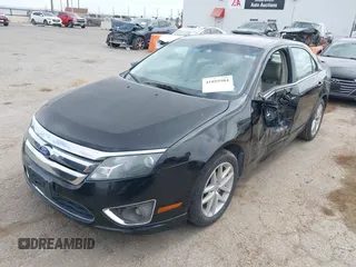 2011 Ford Fusion SEL with VIN 3FAHP0JG9BR279516, listed as a IAAI auction lot 41895984 with 184,718 mi miles. Bid and sale history available at carsss.com. Image 2.