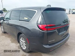 2023 Chrysler Pacifica Touring L with VIN 2C4RC1BG8PR594481, listed as a IAAI auction lot 42618839 with 60,748 mi miles and . Bid and sale history available at DreamBid. Image 3.