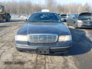 2005 Ford Police Interceptor z VIN 2FAHP71W95X170821, wystawiony jako IAAI lot #41538727 z przebiegiem 115 722 mil mil oraz . Historia ofert i sprzedaży dostępna na DreamBid. Obrazek 12.