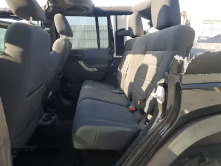 2012 Jeep Wrangler Unlimited Sahara with VIN 1C4BJWEG5CL235835, listed as a Copart auction lot 60673555 with 86,606 mi miles and Salvage title. Bid and sale history available at DreamBid. Image 11.