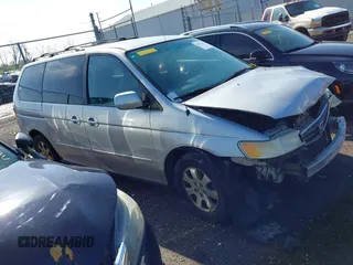 2004 Honda Odyssey EX with VIN 5FNRL18664B051006, listed as a IAAI auction lot 41967247 with 275,047 mi miles and . Bid and sale history available at DreamBid. Image 14.