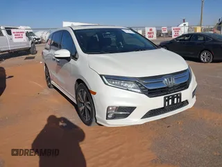 2018 Honda Odyssey Elite with VIN 5FNRL6H95JB049217, listed as a IAAI auction lot 41872032 with 169,842 mi miles. Bid and sale history available at carsss.com. Image 1.