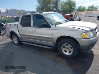 2004 Ford Explorer Sport Trac XLS z VIN 1FMZU77K64UB93602, wystawiony jako IAAI lot #42737380 z przebiegiem 224 488 mil mil oraz . Historia ofert i sprzedaży dostępna na DreamBid. Obrazek 13.