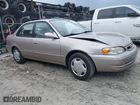 1998 Toyota Corolla VE z VIN 2T1BR18EXWC015480, wystawiony jako IAAI lot #41959316 z przebiegiem 224 304 mil mil oraz . Historia ofert i sprzedaży dostępna na DreamBid. Obrazek 1.