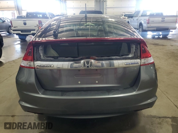 2013 Honda Insight EX with VIN JHMZE2H77DS001810, listed as a Copart auction lot 43332675 with 97,508 mi miles and Salvage title. Bid and sale history available at DreamBid. Image 6.