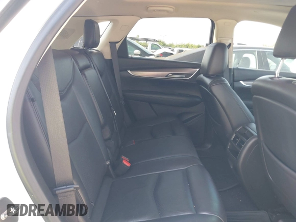 2018 Cadillac XT5 Luxury FWD with VIN 1GYKNCRS2JZ174756, listed as a IAAI auction lot 42192036 with 63,684 mi miles and . Bid and sale history available at carsss.com. Image 8.