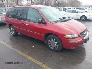 1999 Chrysler Town & Country with VIN 1C4GT64L7XB723937, listed as a IAAI auction lot 41609957 with 242,800 mi miles and . Bid and sale history available at DreamBid. Image 1.