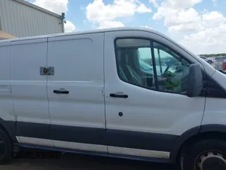 2015 Ford Transit Cargo with VIN 1FTNE1ZM0FKB08313, listed as a IAAI auction lot 42611938 with 335,409 mi miles and . Bid and sale history available at DreamBid. Image 13.