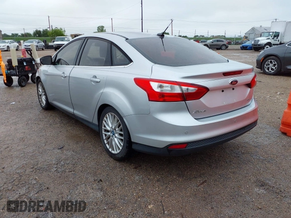 2012 Ford Focus SEL with VIN 1FAHP3H22CL102110, listed as a IAAI auction lot 41963966 with 151,538 mi miles. Bid and sale history available at carsss.com. Image 3.