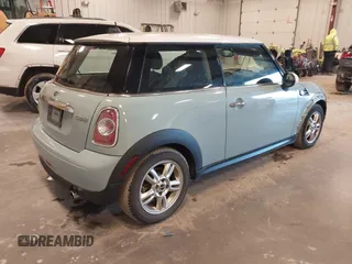 2013 MINI Cooper Hardtop with VIN WMWSU3C56DT373471, listed as a IAAI auction lot 41851137 with 52,825 mi miles. Bid and sale history available at carsss.com. Image 4.
