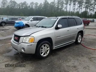 2006 GMC Envoy Denali z VIN 1GKES63M662197789, wystawiony jako Copart lot #57807885 z przebiegiem 202 469 mil mil oraz Szkoda całkowita • Salvage title. Historia ofert i sprzedaży dostępna na DreamBid. Obrazek 1.