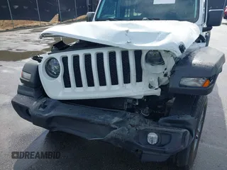 2023 Jeep Wrangler Sport S with VIN 1C4HJXDN9PW540842, listed as a IAAI auction lot 41712336 with 36,017 mi miles and . Bid and sale history available at DreamBid. Image 6.