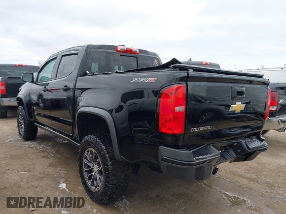 2018 Chevrolet Colorado 4WD ZR2 with VIN 1GCGTEEN9J1173647, listed as a IAAI auction lot 42016015 with 102,041 mi miles. Bid and sale history available at carsss.com. Image 3.