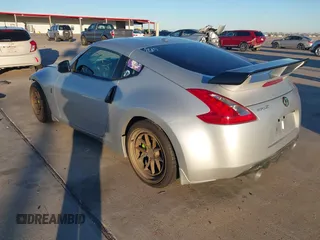 2014 Nissan 370Z Nismo with VIN JN1AZ4EH4EM634236, listed as a IAAI auction lot 41256664 with 80,294 mi miles and . Bid and sale history available at DreamBid. Image 3.