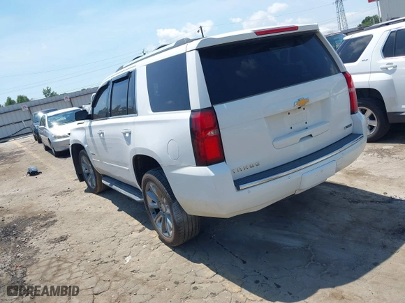 2018 Chevrolet Tahoe Premier with VIN 1GNSCCKCXJR324733, listed as a IAAI auction lot 40102147 with 119,134 mi miles. Bid and sale history available at carsss.com. Image 3.