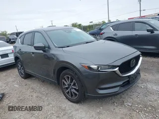 2018 Mazda CX-5 Touring z VIN JM3KFBCM5J0347740, wystawiony jako IAAI lot #42286395 z przebiegiem 81 531 mil mil oraz . Historia ofert i sprzedaży dostępna na DreamBid. Obrazek 1.
