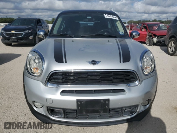 2013 MINI Paceman S z VIN WMWSS5C56DWN49287, wystawiony jako Copart lot #71075014 z przebiegiem 97 292 mil mil oraz Szkoda całkowita • Salvage title. Historia ofert i sprzedaży dostępna na DreamBid. Obrazek 5.