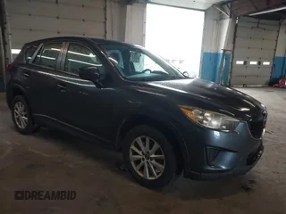 2013 Mazda CX-5 Sport z VIN JM3KE2BE0D0131781, wystawiony jako IAAI lot #42202370 z przebiegiem 240 516 mil mil oraz . Historia ofert i sprzedaży dostępna na DreamBid. Obrazek 1.
