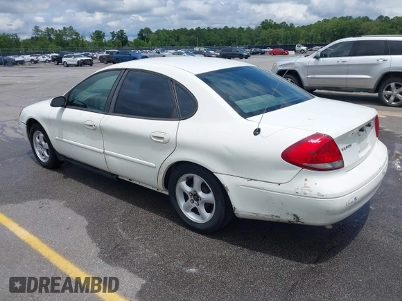 2003 Ford Taurus SE Standard with VIN 1FAFP53U13A192387, listed as a IAAI auction lot 42398723 with 247,077 mi miles and . Bid and sale history available at DreamBid. Image 3.