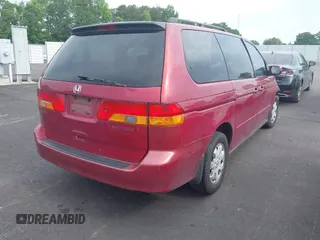 2002 Honda Odyssey EX with VIN 5FNRL18622B016265, listed as a IAAI auction lot 42294568 with 231,703 mi miles and . Bid and sale history available at DreamBid. Image 4.