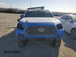 2020 Toyota Tacoma SR5 z VIN 3TMCZ5AN6LM310164, wystawiony jako Copart lot #47098995 z przebiegiem 18 285 mil mil oraz Szkoda całkowita • Salvage title. Historia ofert i sprzedaży dostępna na DreamBid. Obrazek 5.