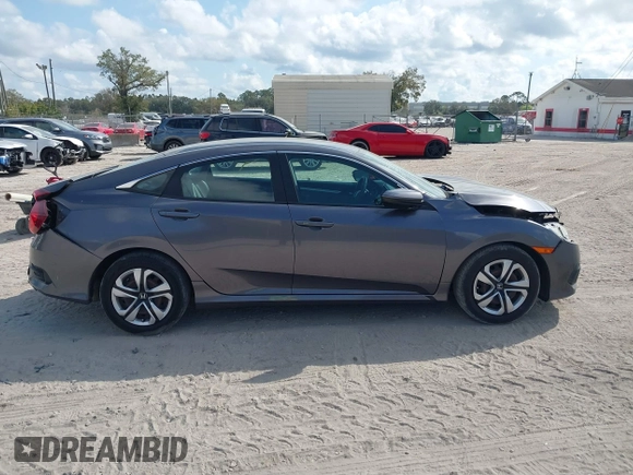 2017 Honda Civic LX with VIN 19XFC2F51HE036153, listed as a IAAI auction lot 41546498 with 78,726 mi miles and . Bid and sale history available at DreamBid. Image 13.