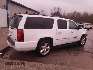 2009 Chevrolet Suburban LTZ with VIN 1GNFC36019J122990, listed as a Copart auction lot 79067174 with 167,632 mi miles and Salvage title. Bid and sale history available at DreamBid. Image 3.