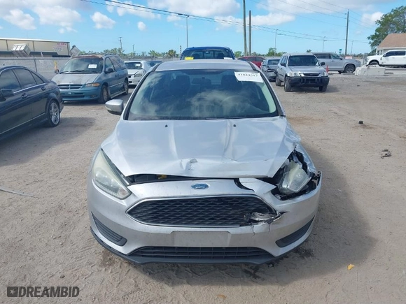 2015 Ford Focus SE with VIN 1FADP3F27FL215346, listed as a IAAI auction lot 41824517 with 124,396 mi miles. Bid and sale history available at carsss.com. Image 12.