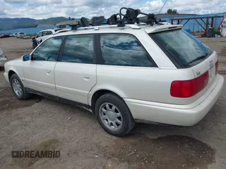 1996 Audi A6 z VIN WAUJA84A9TN106938, wystawiony jako IAAI lot #42287751 z przebiegiem 163 427 mil mil oraz . Historia ofert i sprzedaży dostępna na DreamBid. Obrazek 3.