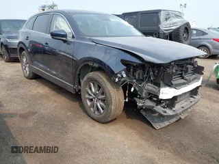 2023 Mazda CX-9 Touring with VIN JM3TCBCY6P0642838, listed as a IAAI auction lot 42407123 with 15,181 mi miles and . Bid and sale history available at DreamBid. Image 1.