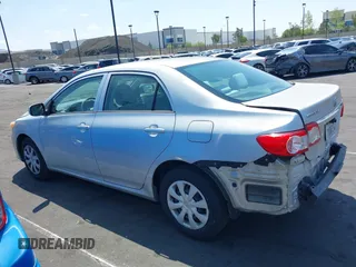 2013 Toyota Corolla L with VIN 5YFBU4EE3DP207633, listed as a IAAI auction lot 42131218 with 89,899 mi miles and . Bid and sale history available at DreamBid. Image 15.