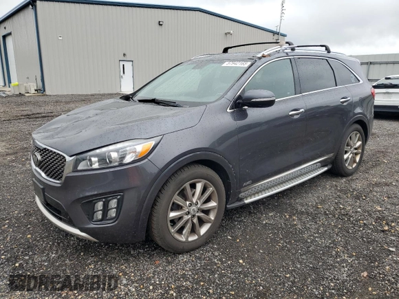 2016 Kia Sorento SX z VIN 5XYPKDA51GG152979, wystawiony jako Copart lot #57942165 z przebiegiem 189 283 mil mil oraz Szkoda całkowita • Salvage title. Historia ofert i sprzedaży dostępna na DreamBid. Obrazek 1.