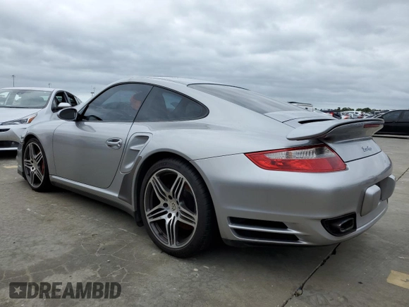 2007 Porsche 911 Turbo with VIN WP0AD29957S784485, listed as a Copart auction lot 75090564 with Not Provided miles and Salvage Title. Bid and sale history available at DreamBid. Image 2.