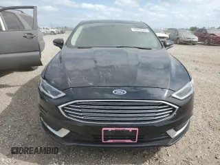 2018 Ford Fusion SE z VIN 3FA6P0HD8JR217719, wystawiony jako Copart lot #53429555 z przebiegiem 108 953 mil mil oraz Szkoda całkowita • Salvage title. Historia ofert i sprzedaży dostępna na DreamBid. Obrazek 5.