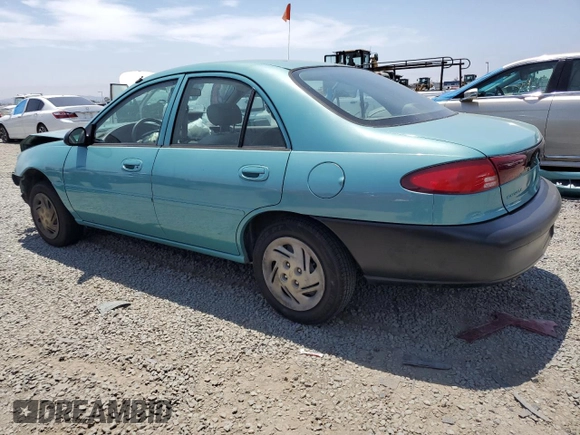 1999 Ford Escort LX with VIN 1FAFP10P6XW196483, listed as a Copart auction lot 59215635 with 74,859 mi miles and Salvage title. Bid and sale history available at DreamBid. Image 2.