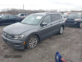 2019 Volkswagen Tiguan S with VIN 3VV0B7AX1KM046808, listed as a IAAI auction lot 41911225 with 62,972 mi miles and . Bid and sale history available at DreamBid. Image 2.